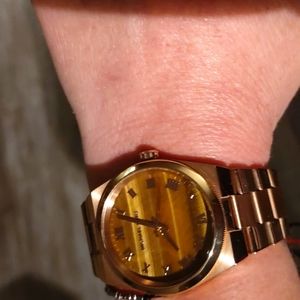 Micheal Kors gold tone watch with tigers eye face